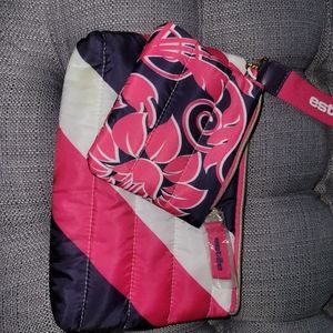 Estee Lauder puffy makeup bag with attached smaller.